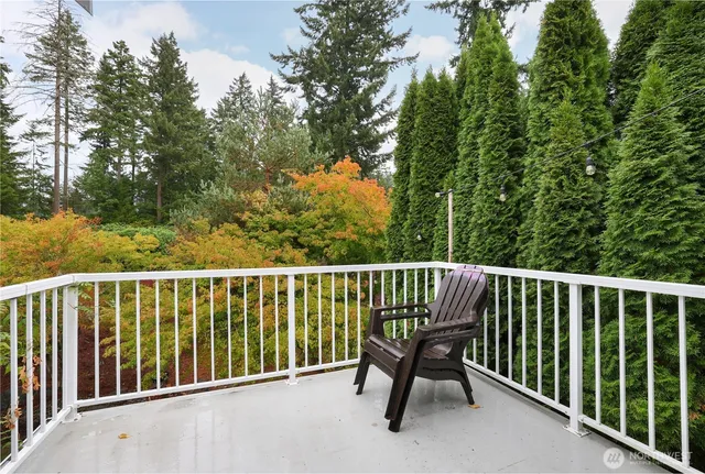 a bed room with a bed and a television in it
