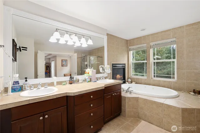 a view of a bedroom with closet and cabinet