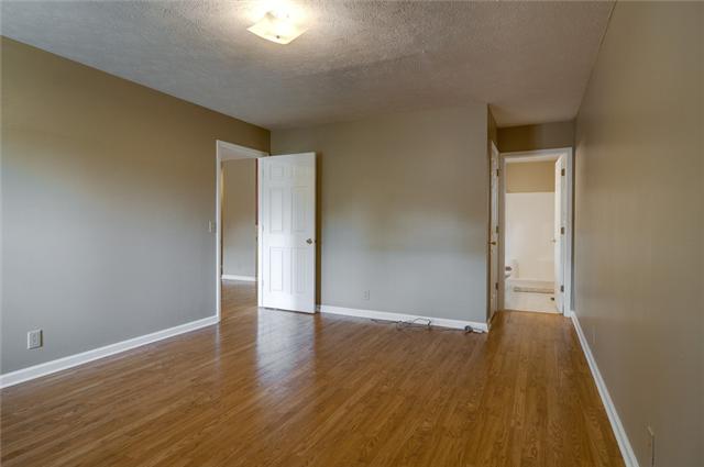 3121 Country Way Road Antioch, TN 37013 - Photo 16 of 20 Huge 16x12 Master bedroom w/ hardwoods, full bath, walk-in closet w/ light, lots of natural light & view of back yard! Note: Master is private ---on opposite side of home from the other 2 bedrooms!