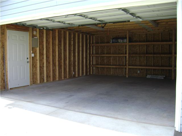 3121 Country Way Road Antioch, TN 37013 - Photo 6 of 20 New Garage has plenty of shelves, storage, side door & cute little remotes ---that fit in your pockets OR ladies...in the purse! Note: Are you are a 1st Time Home Buyer OR have NOT owned in 3 years --- You may qualify for a ZERO down payment!!!