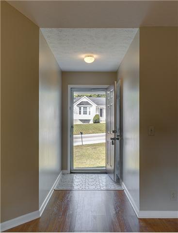 3121 Country Way Road Antioch, TN 37013 - Photo 9 of 20 Nice view of front foyer entrance! It offers large pebble stoned tile! Not to mention, the well maincured lawn acorss the street!!!