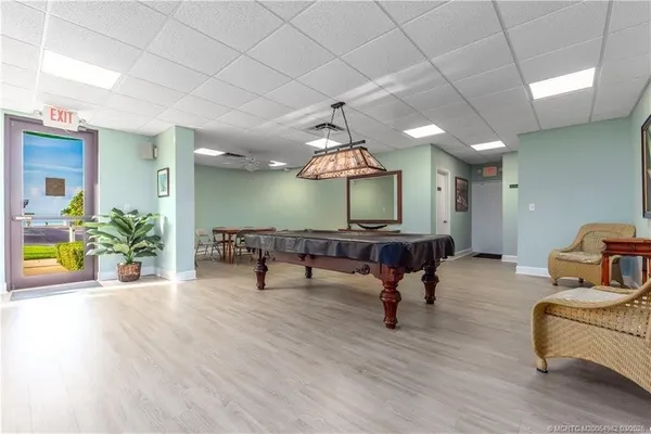 a room with furniture and a wooden floor