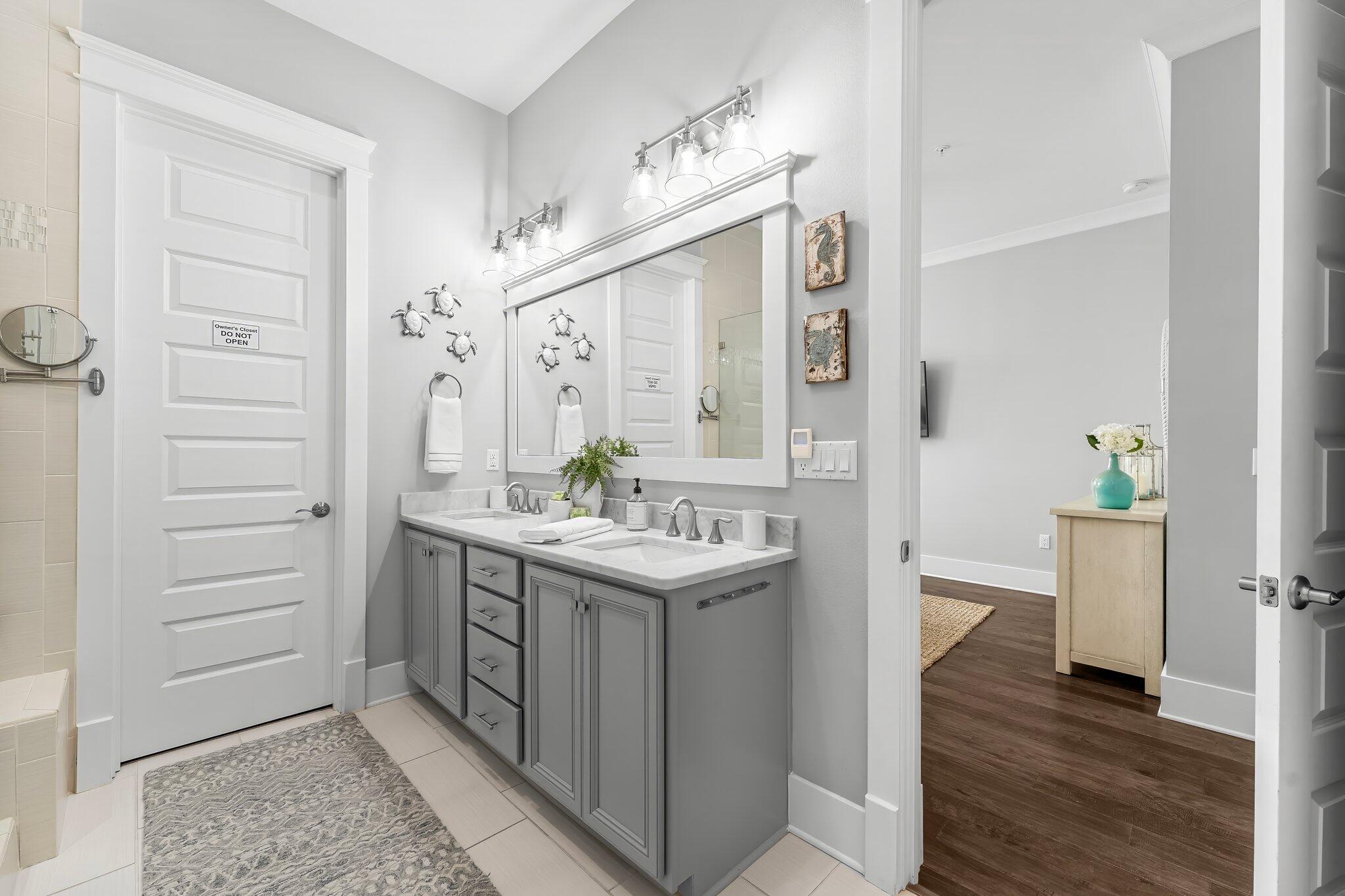 116 Gulfview Way Santa Rosa Beach, FL 32459 - Photo 23 of 59 a bathroom with a sink and a mirror
