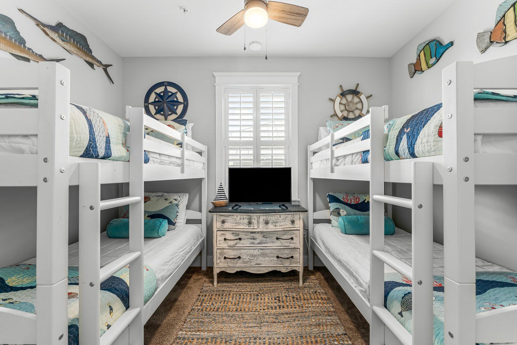 116 Gulfview Way Santa Rosa Beach, FL 32459 - Photo 31 of 59 a living room with furniture and a flat screen tv
