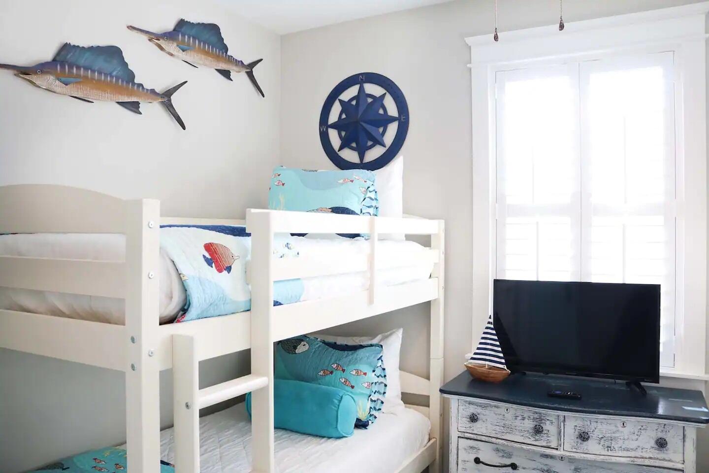 116 Gulfview Way Santa Rosa Beach, FL 32459 - Photo 32 of 59 a living room with furniture and a flat screen tv