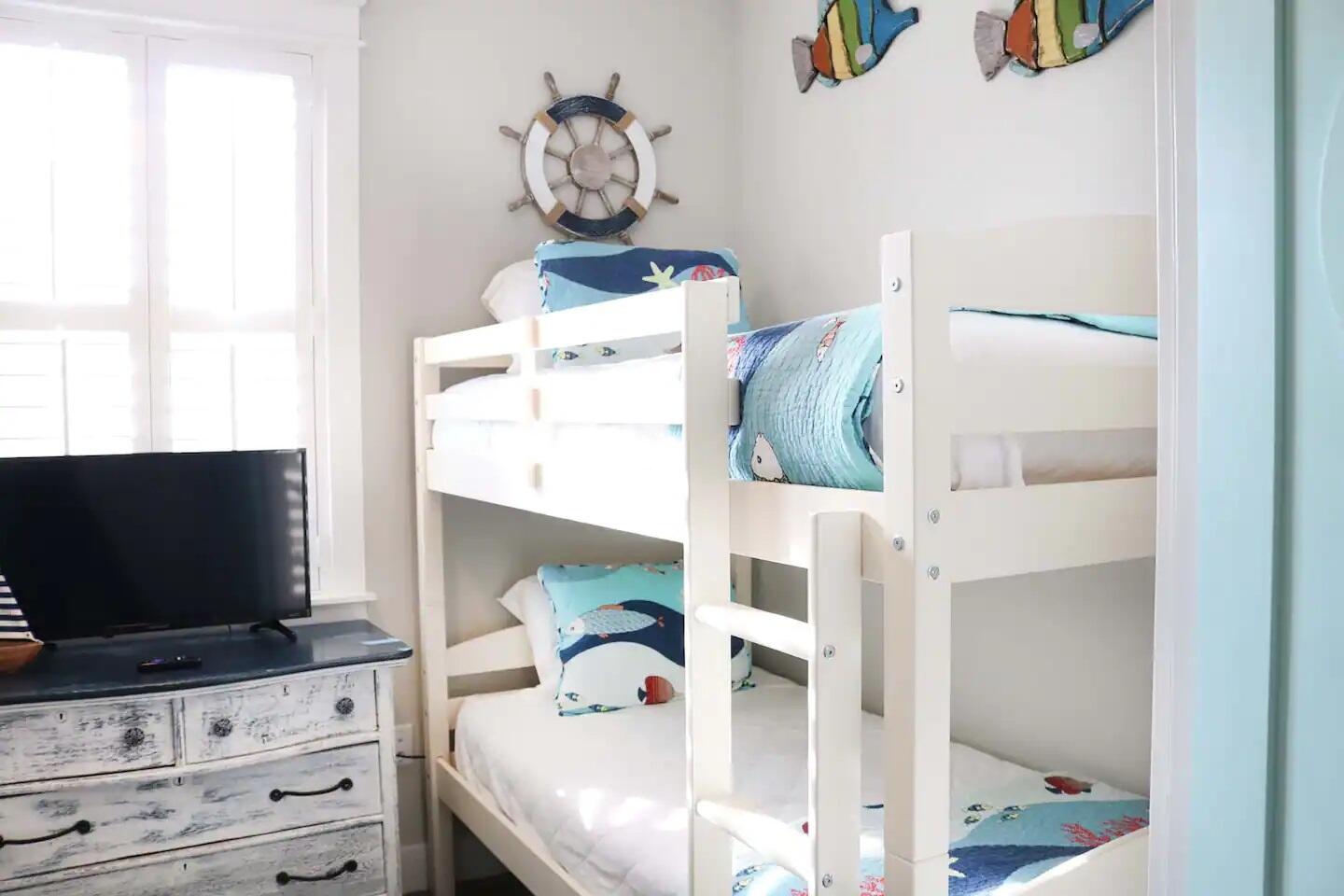 116 Gulfview Way Santa Rosa Beach, FL 32459 - Photo 33 of 59 a living room with furniture and a flat screen tv