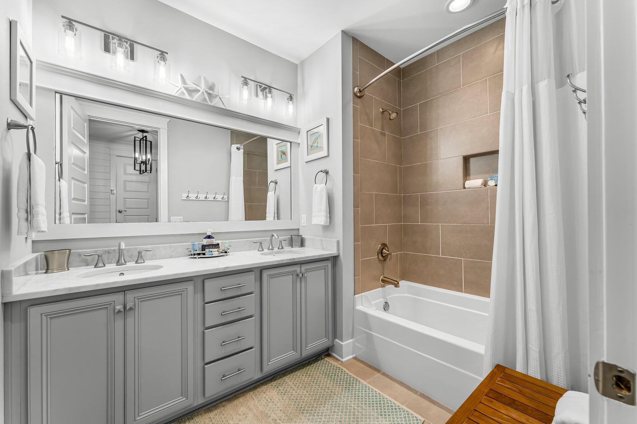 116 Gulfview Way Santa Rosa Beach, FL 32459 - Photo 35 of 59 a bathroom with a double vanity sink mirror double and bathtub