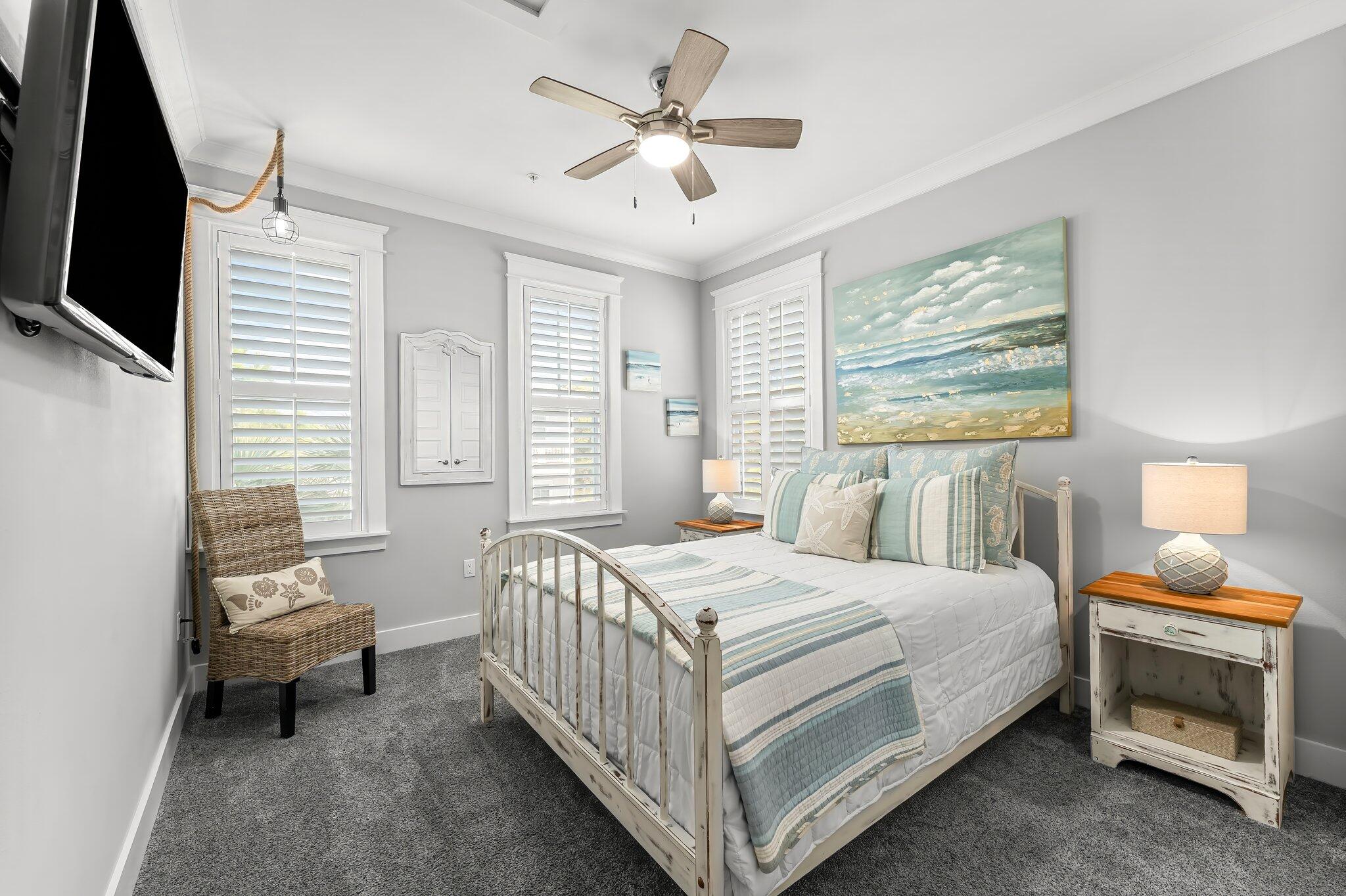 116 Gulfview Way Santa Rosa Beach, FL 32459 - Photo 38 of 59 a bedroom with a bed and a tv