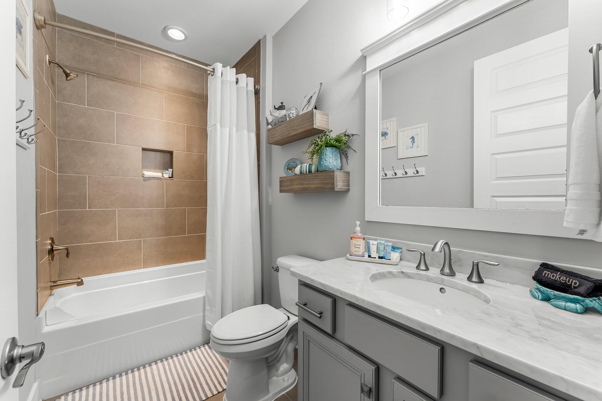 116 Gulfview Way Santa Rosa Beach, FL 32459 - Photo 40 of 59 a bathroom with a granite countertop sink toilet and shower