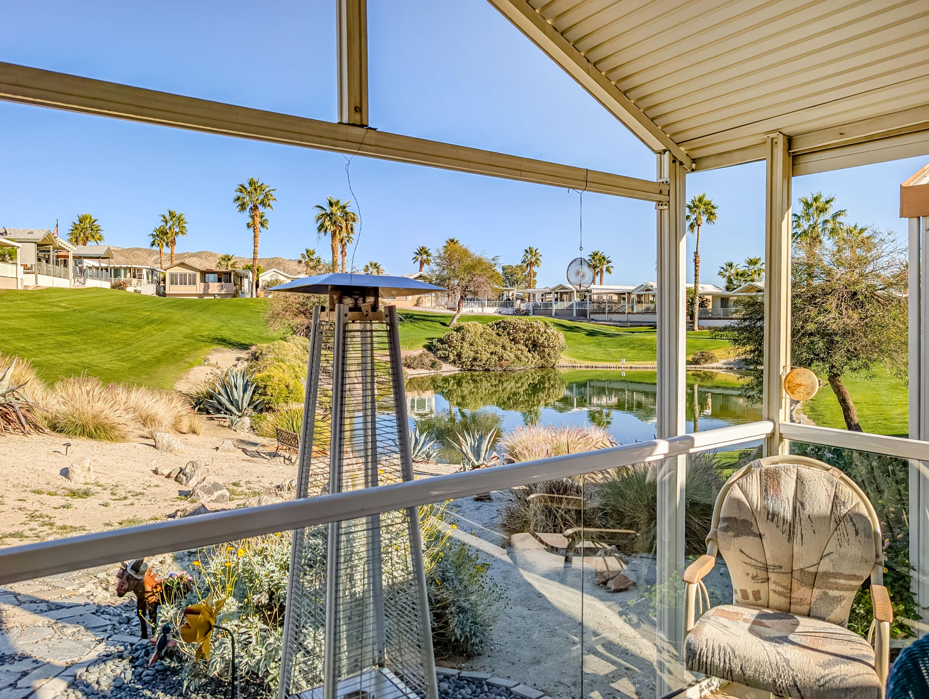 70200 Dillon Road, Unit 493 Desert Hot Springs, CA 92241 - Photo 12 of 35 a view of a ocean from a balcony