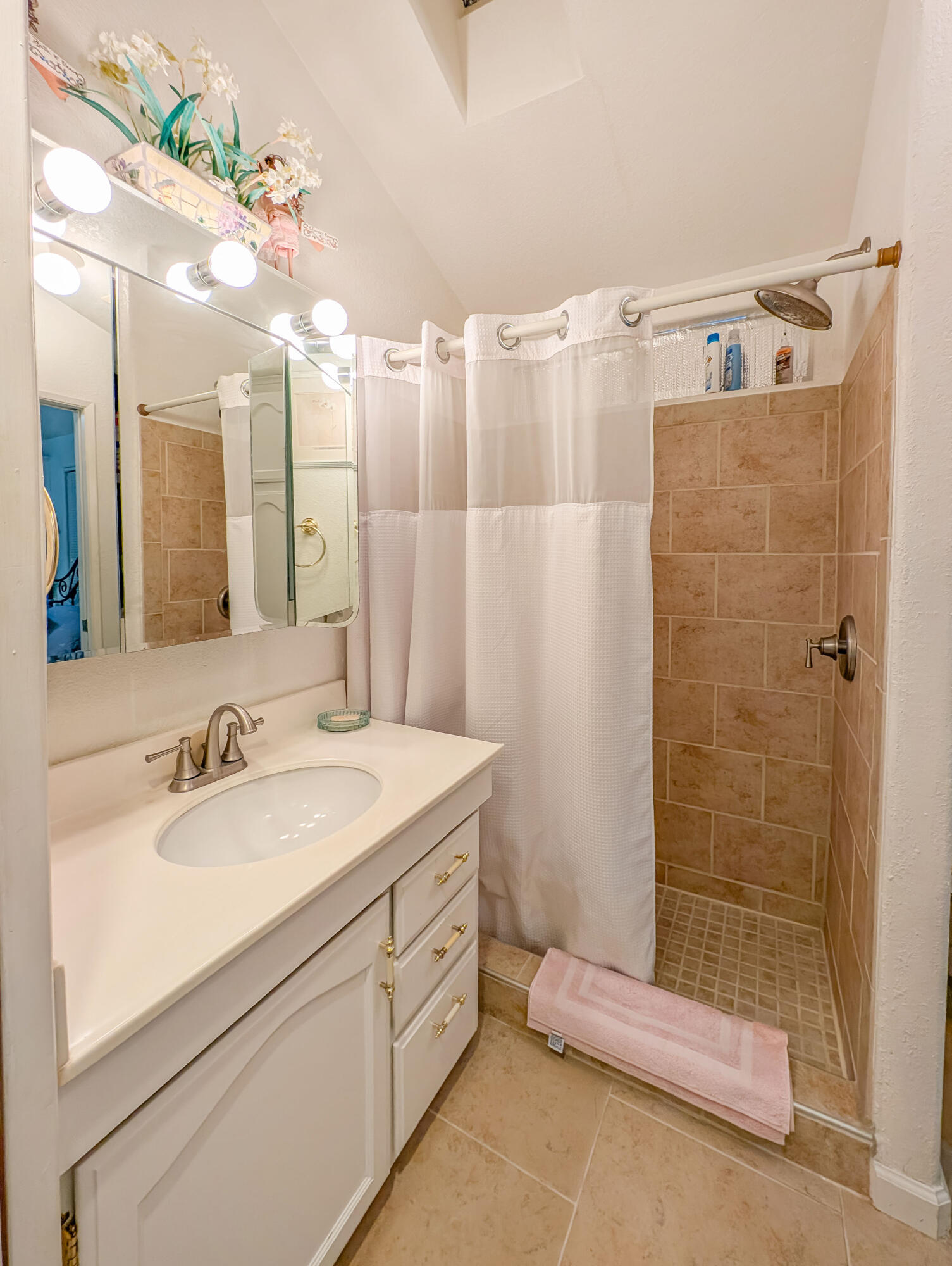 70200 Dillon Road, Unit 493 Desert Hot Springs, CA 92241 - Photo 24 of 35 a bathroom with a sink a toilet and shower