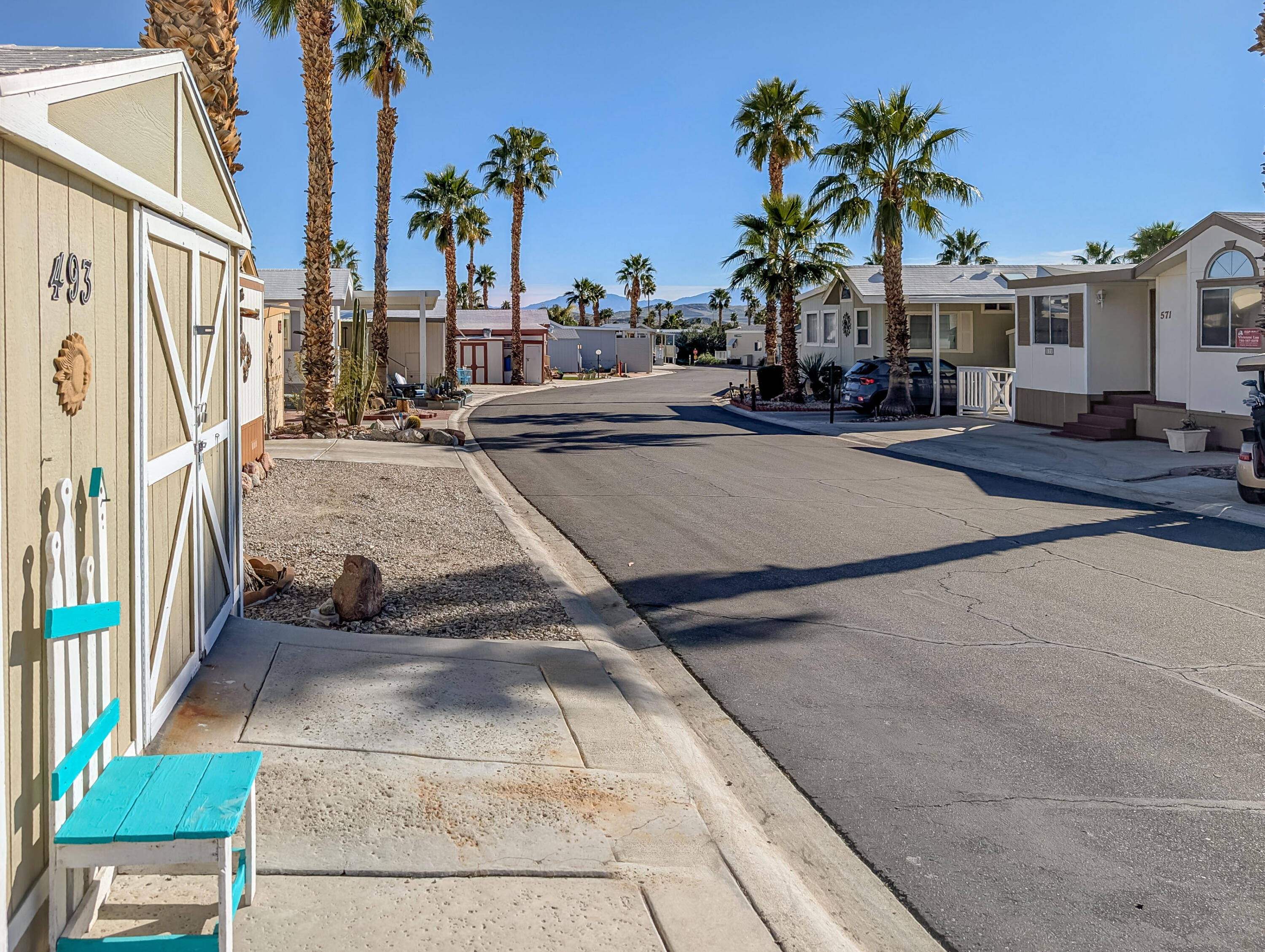 70200 Dillon Road, Unit 493 Desert Hot Springs, CA 92241 - Photo 3 of 35 a view of a backyard of the house