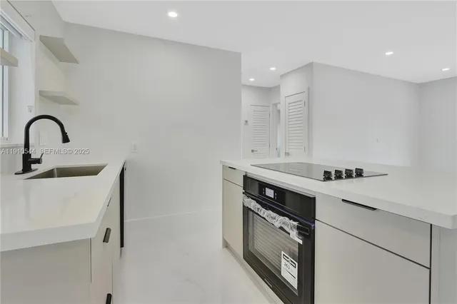 a bedroom with a bed and a table