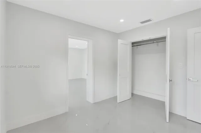 a view of hallway with window