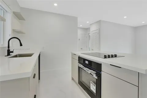 a view of an empty room and a gallery