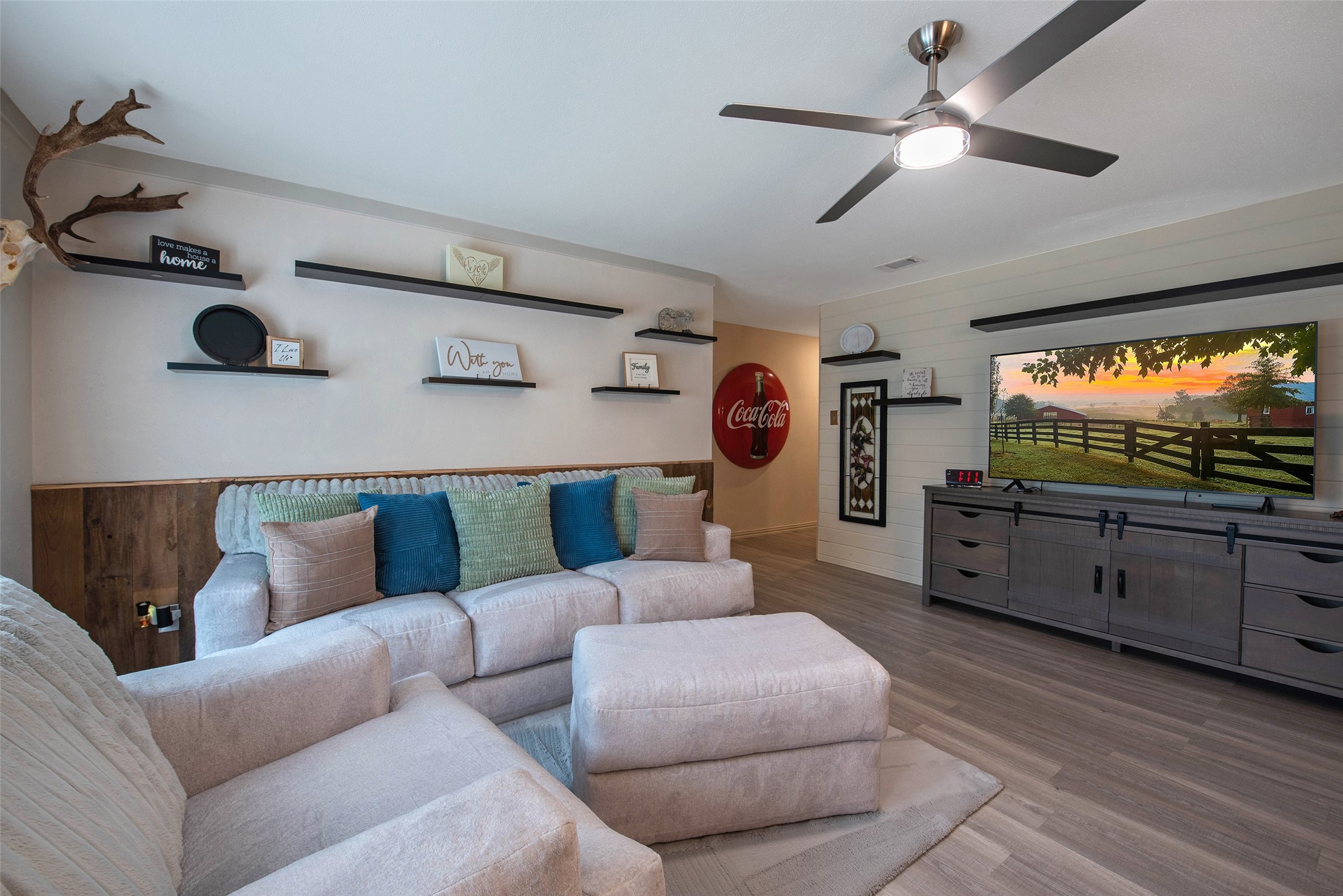 12998 Rocky Road Conroe, TX 77306 - Photo 17 of 50 a living room with furniture and a flat screen tv