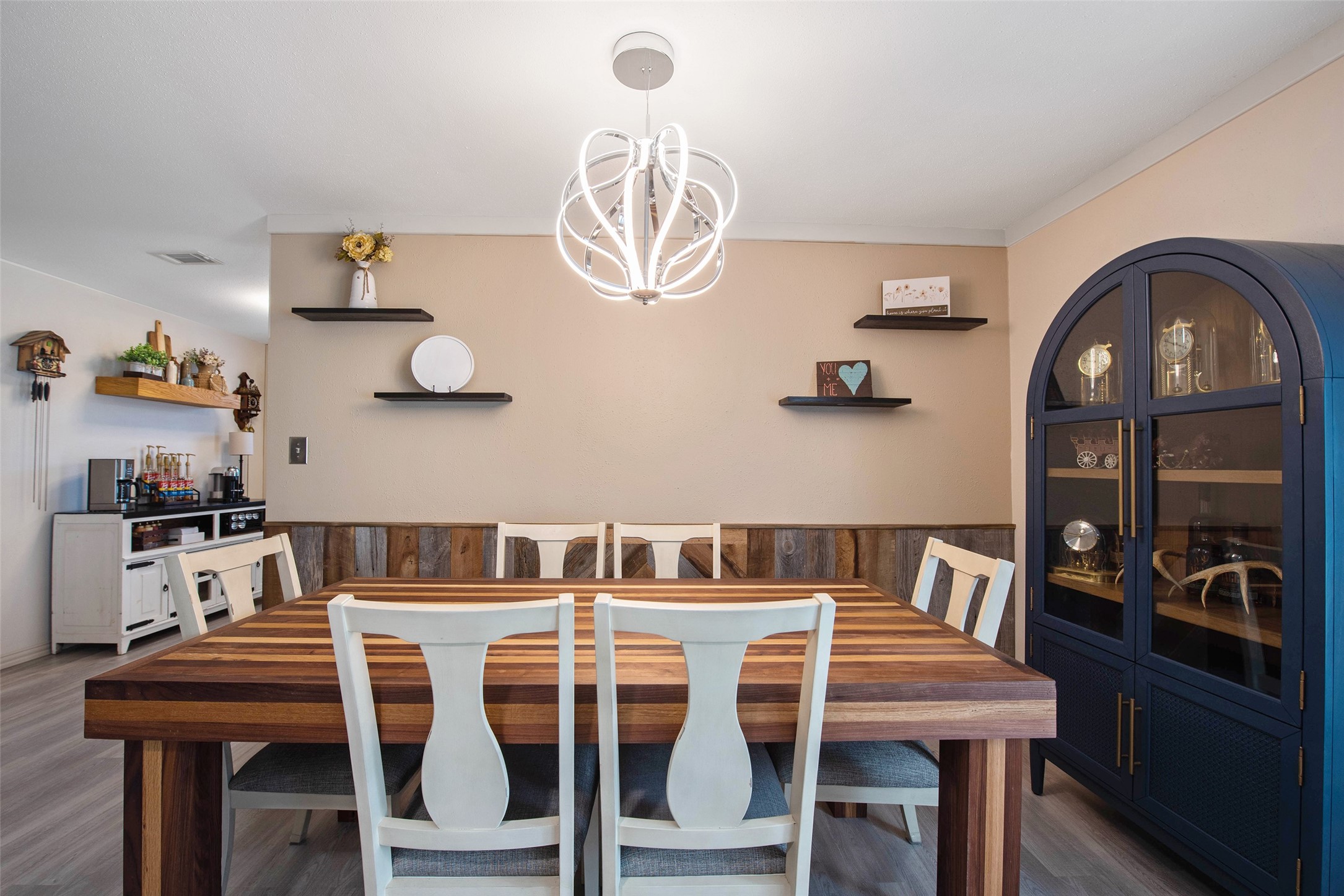 12998 Rocky Road Conroe, TX 77306 - Photo 19 of 50 a view of a dining room with furniture and wooden floor