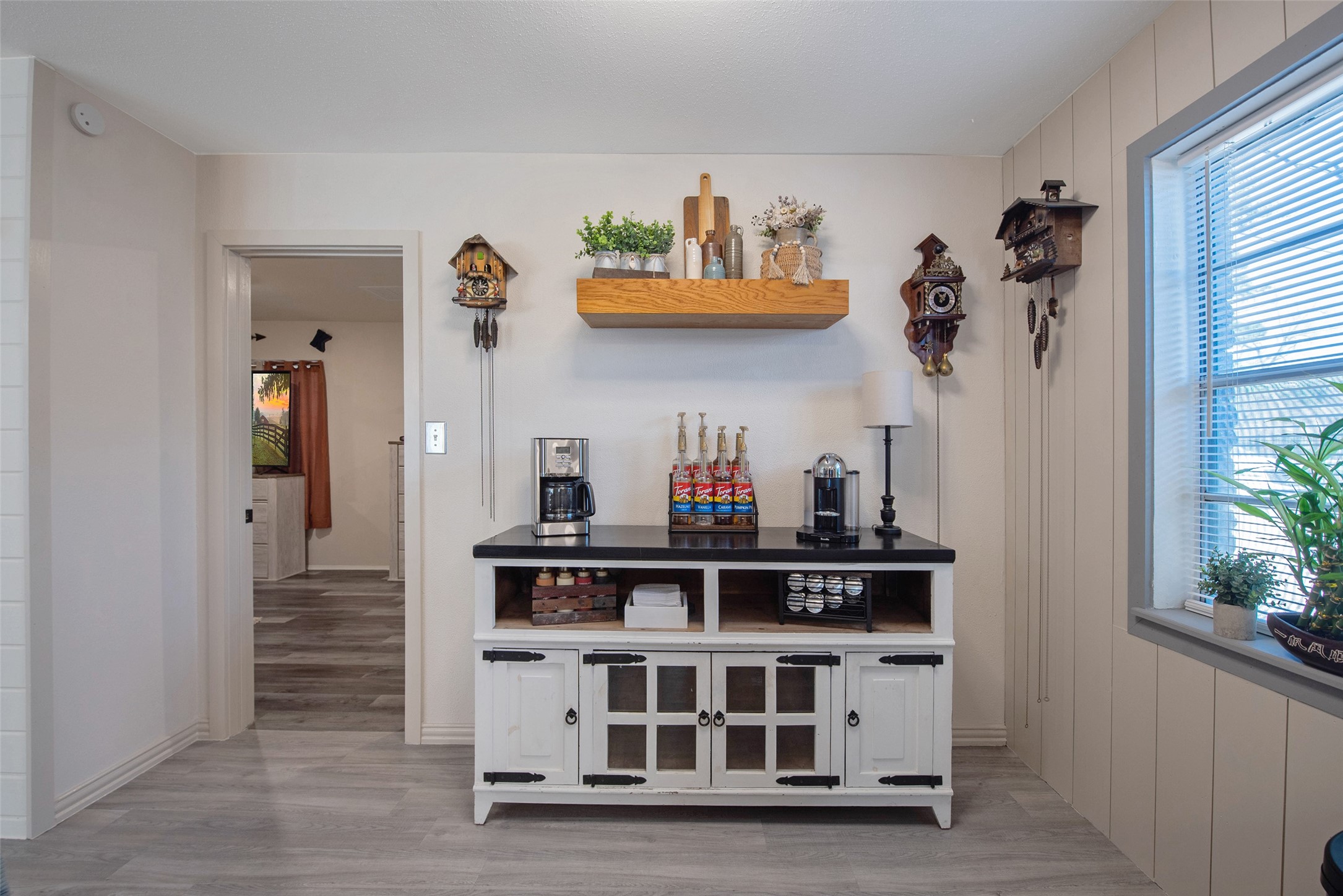 12998 Rocky Road Conroe, TX 77306 - Photo 25 of 50 a view of a hallway with cabinets and a window