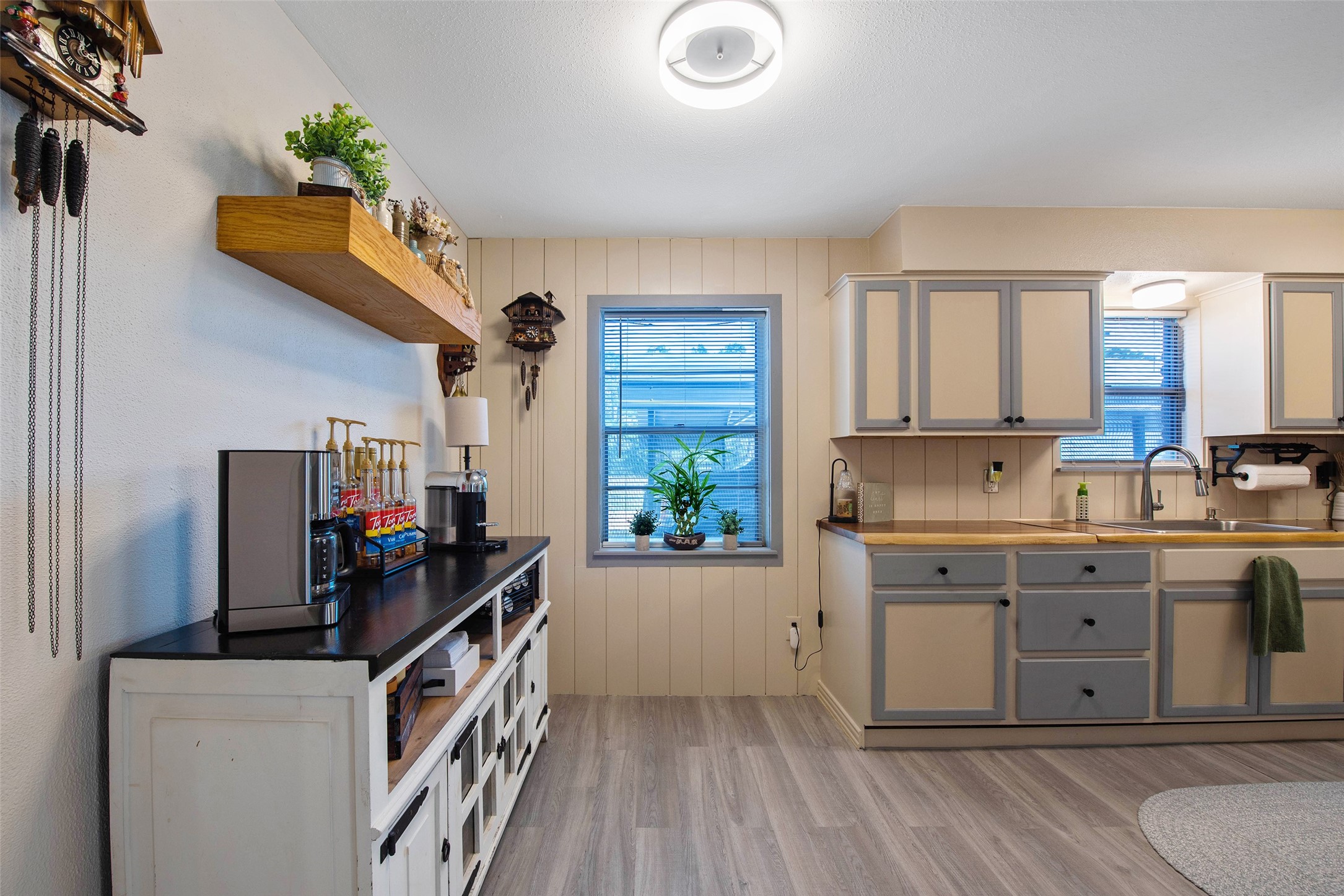 12998 Rocky Road Conroe, TX 77306 - Photo 26 of 50 a kitchen with a refrigerator and window
