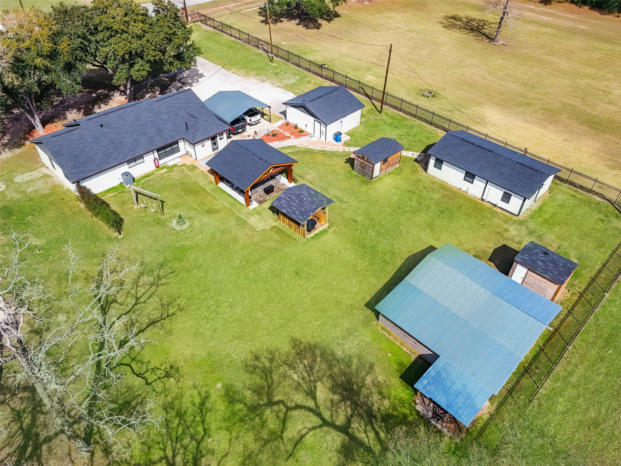 12998 Rocky Road Conroe, TX 77306 - Photo 5 of 50 an aerial view of residential houses with outdoor space