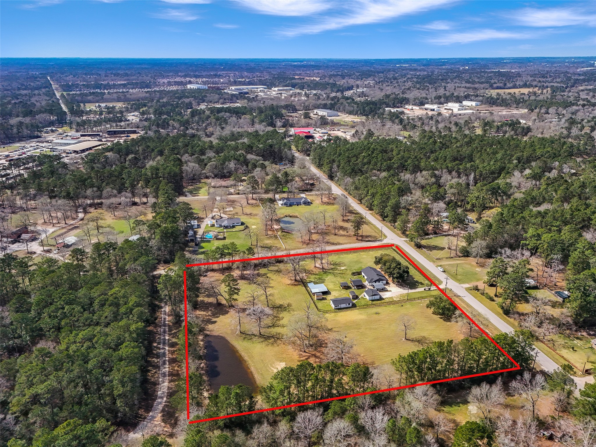 12998 Rocky Road Conroe, TX 77306 - Photo 9 of 50 a view of a city