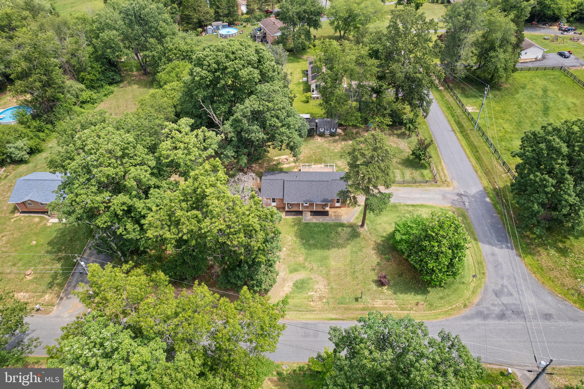 12237 Randle Lane Culpeper, VA 22701 - Photo 27 of 31 an aerial view of residential house with outdoor space and trees all around