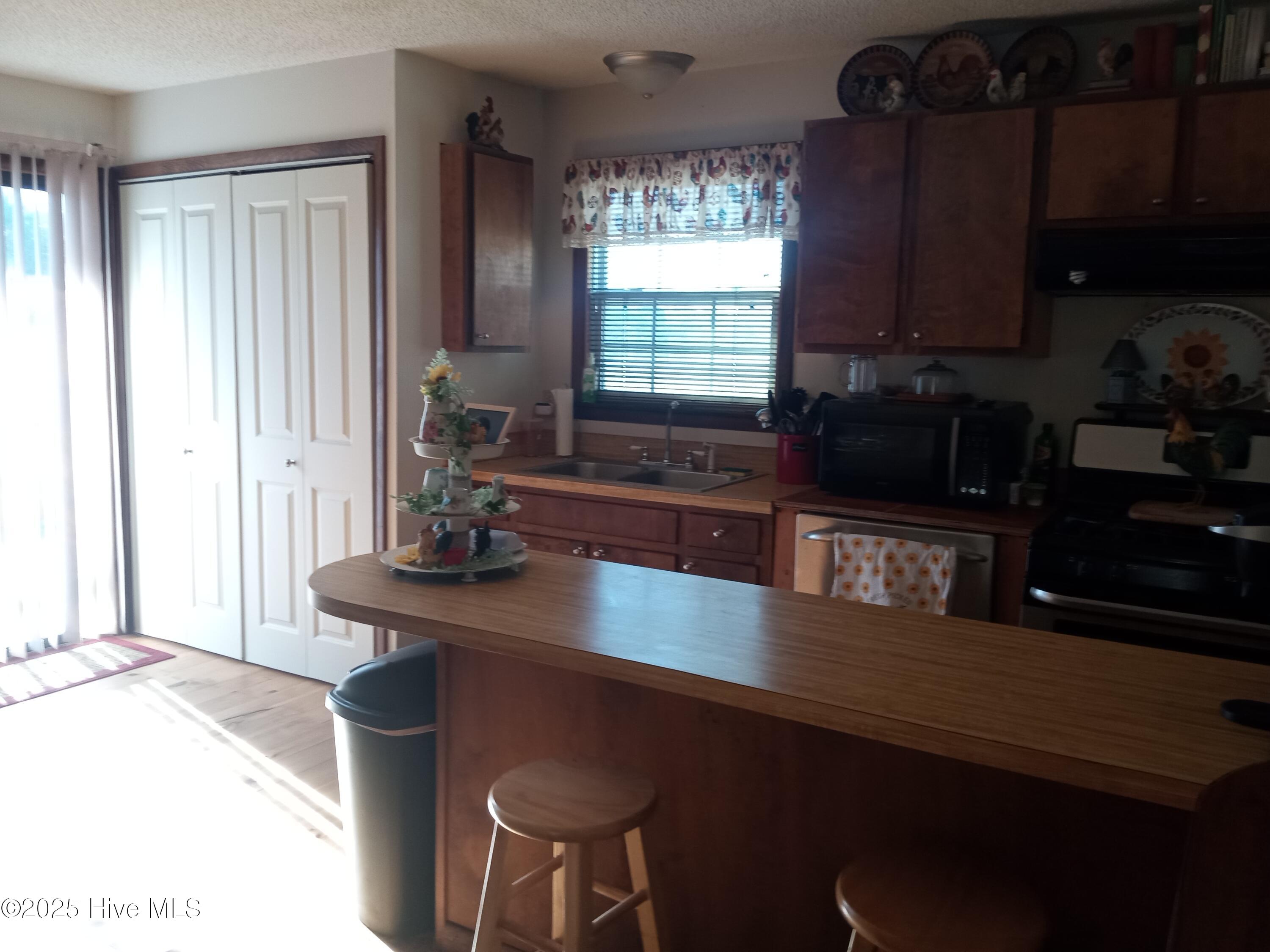2391 Bill Hooks Road Whiteville, NC 28472 - Photo 17 of 39 Primary Kitchen