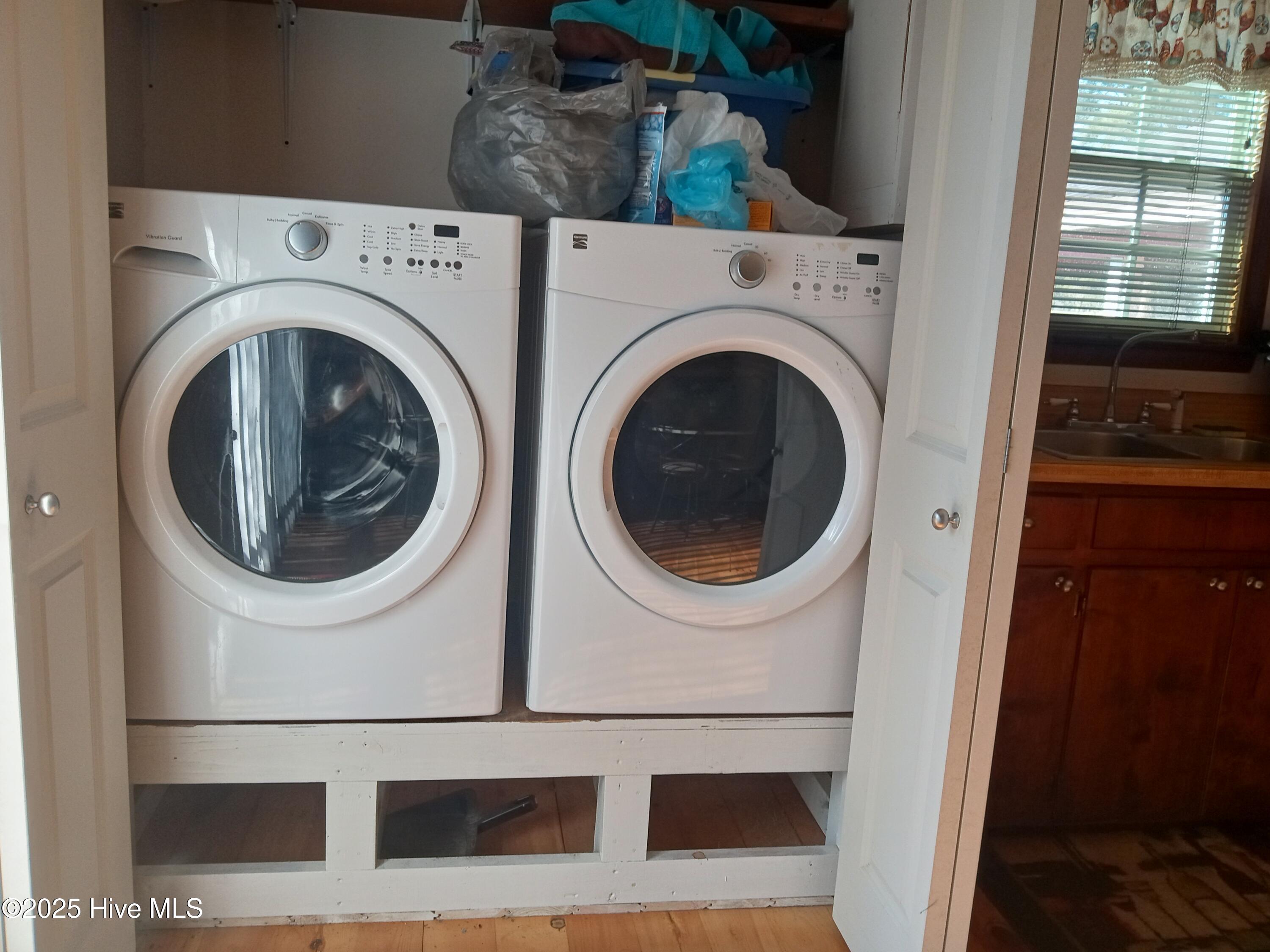2391 Bill Hooks Road Whiteville, NC 28472 - Photo 18 of 39 Laundry off of the kitchen on the primary floor