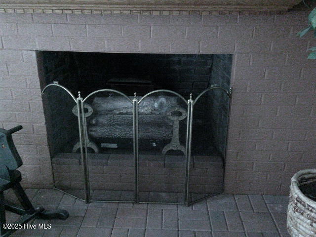 2391 Bill Hooks Road Whiteville, NC 28472 - Photo 27 of 39 1 of 2 Real fireplaces with damper currently with gas logs in the master bedroom