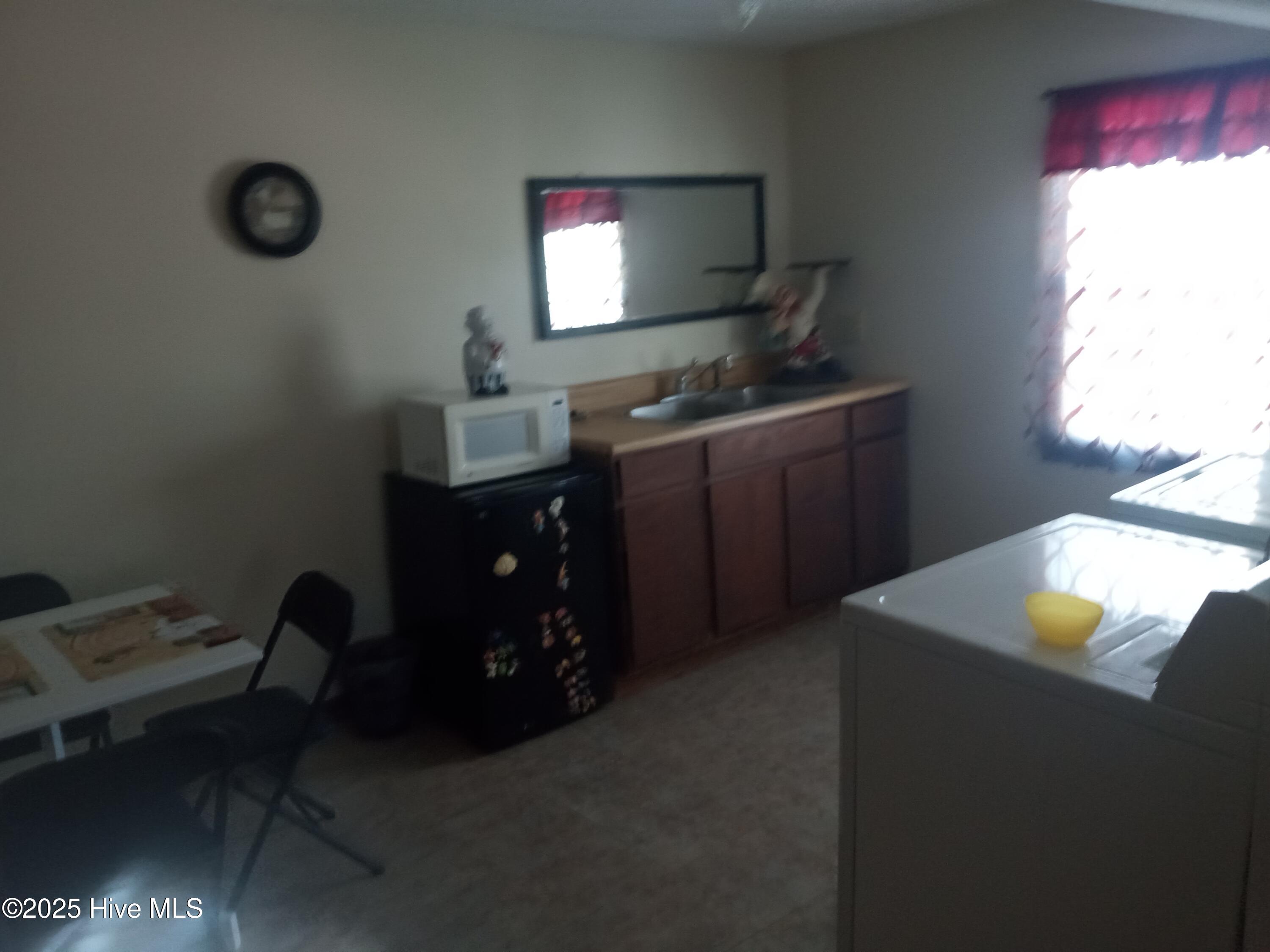 2391 Bill Hooks Road Whiteville, NC 28472 - Photo 30 of 39 Kitchenette on the second floor