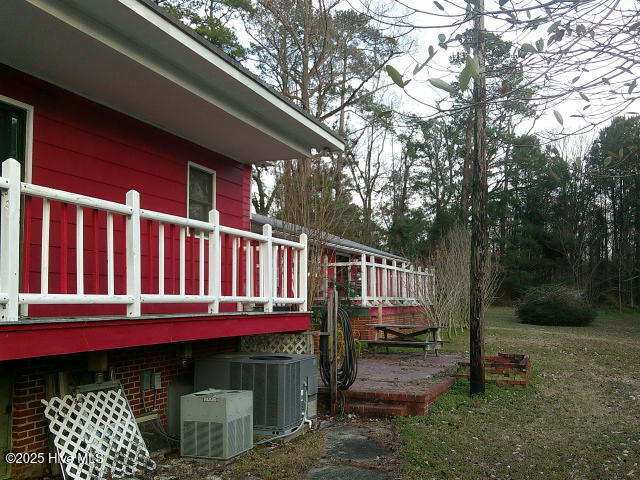 2391 Bill Hooks Road Whiteville, NC 28472 - Photo 7 of 39 Porch off of the kitchen