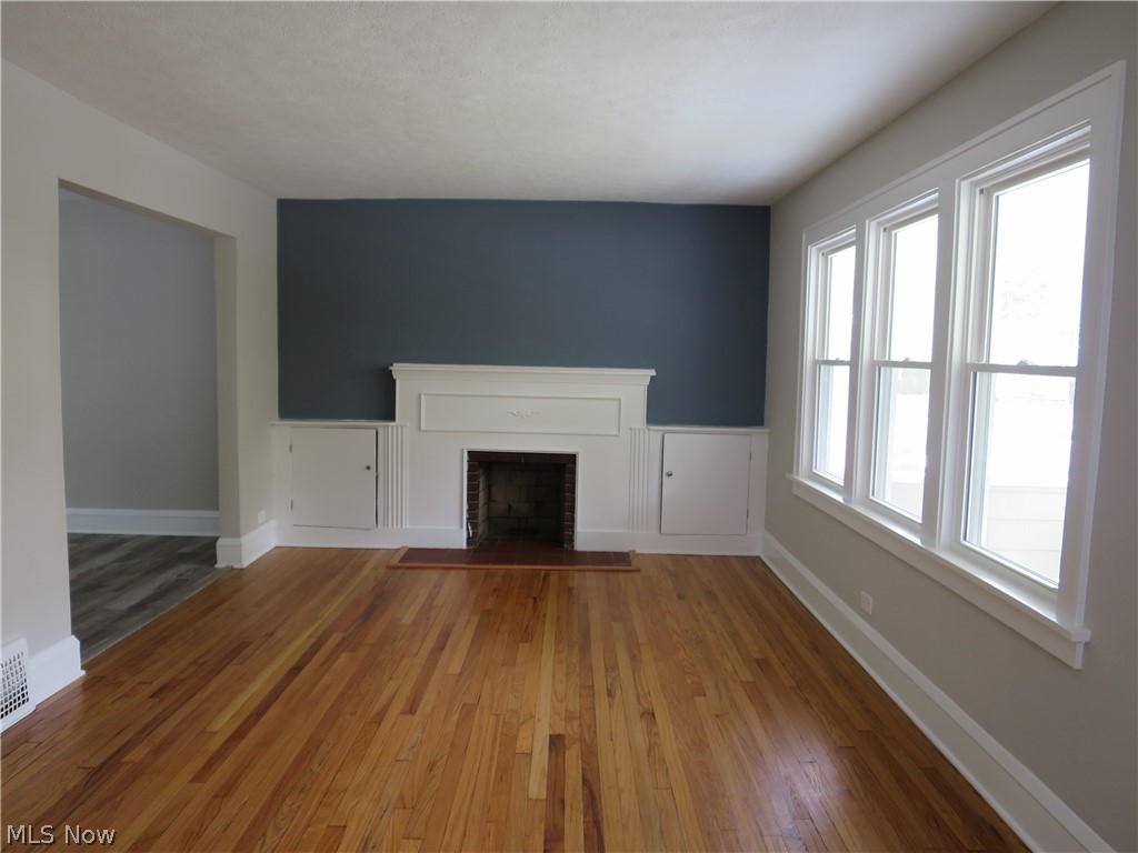 1052 Elbon Road Cleveland, OH 44121 - Photo 3 of 21 Gleaming hardwood floors as you enter the property.
