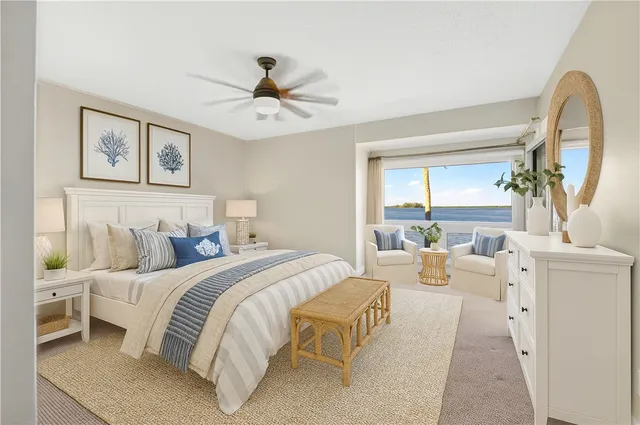 a bed room with a bed and a chandelier