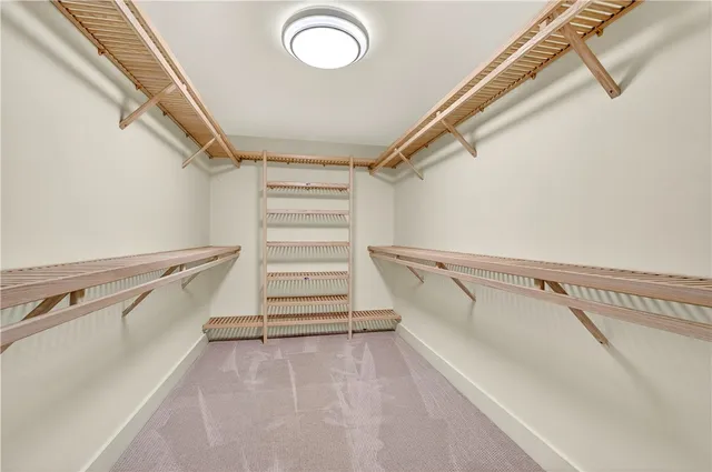 a view of bathroom with a toilet sink and shower