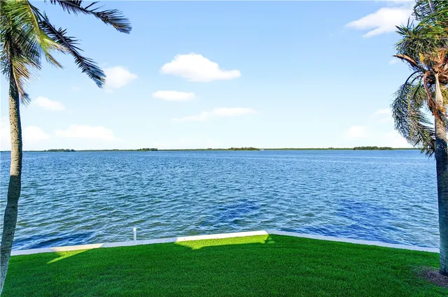 a view of a house with a flower garden