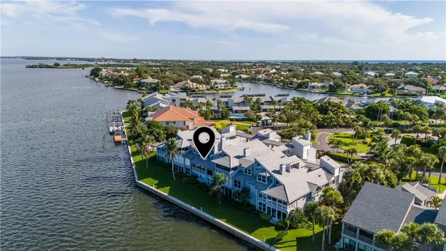 a view of swimming pool with a table and chairs