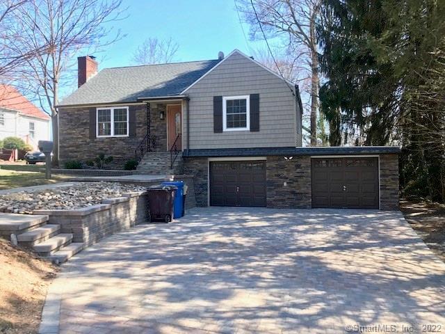 a front view of a house with yard
