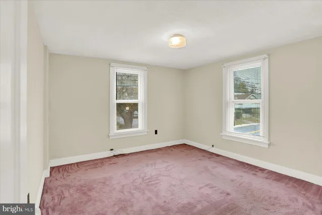 a bathroom with a sink a mirror and shower
