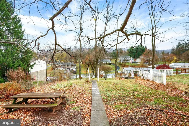 a view of balcony with wooden floor