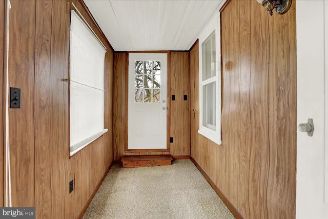 an empty room with windows