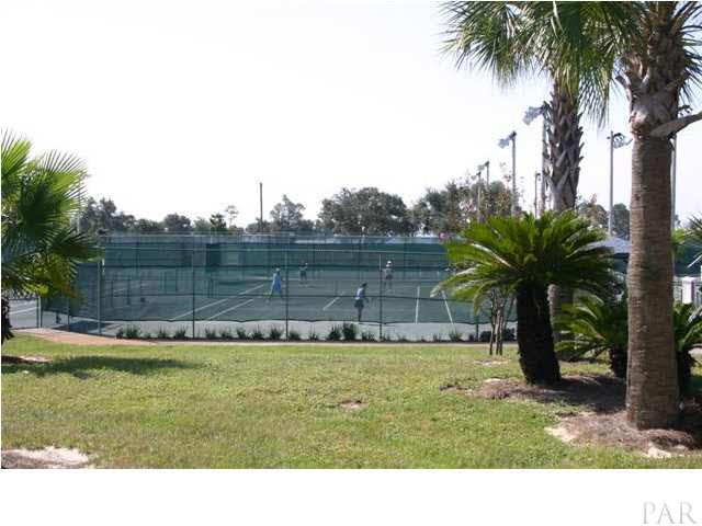 10-98 Bryant Road Navarre, FL 32566 - Photo 9 of 14 The eight clay lighted tennis courts.