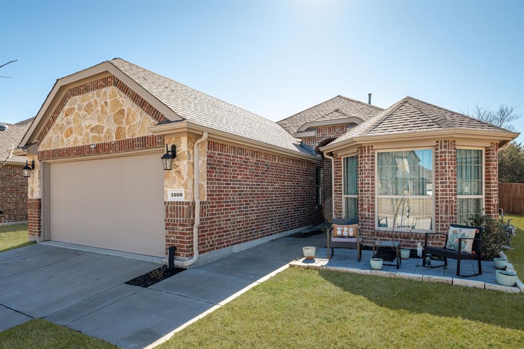 1500 Elizabeth Street Anna, TX 75409 - Photo 23 of 25 a view of a house with patio furniture and a yard