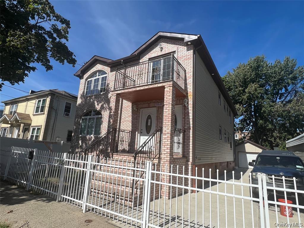 153-33 119th Road Queens, NY 11434 - Photo 1 of 9 a front view of a house