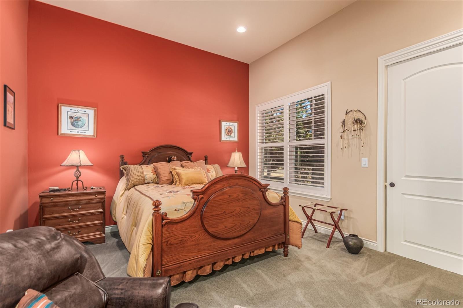 4318 Chateau Ridge Road Castle Rock, CO 80108 - Photo 26 of 50 a bedroom with bed and a window