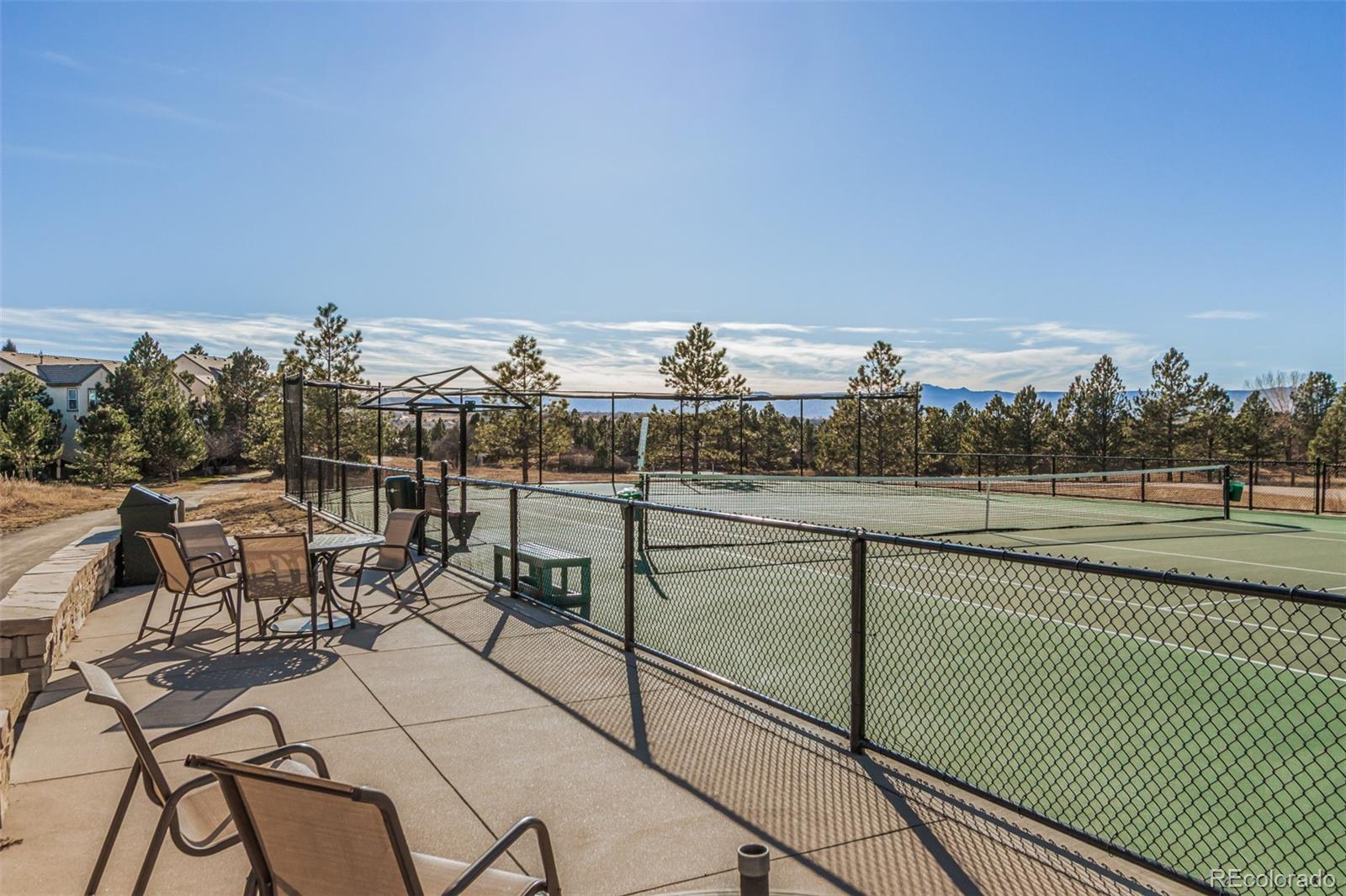 4318 Chateau Ridge Road Castle Rock, CO 80108 - Photo 49 of 50 a view of a terrace with sitting area