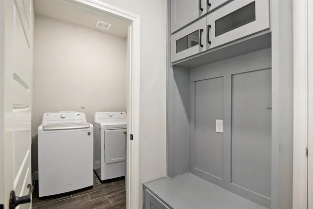 a utility room with dryer and washer