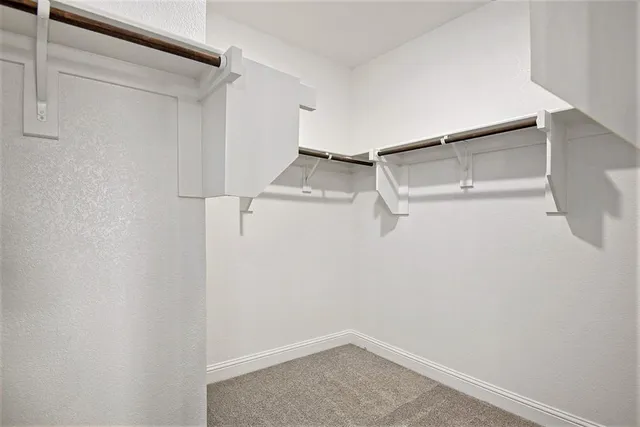 a view of a room with racks on the wall