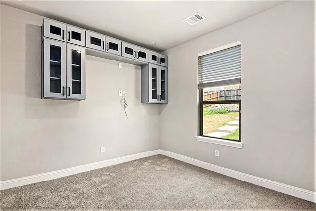 an empty room with a window