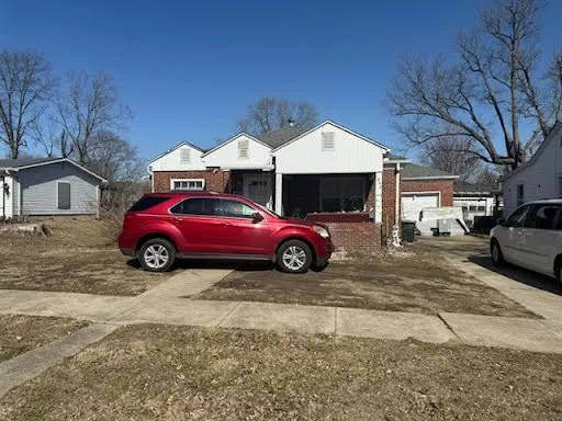 a view of a cars parked in garage