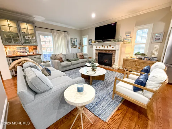 a kitchen with sink stove and cabinets
